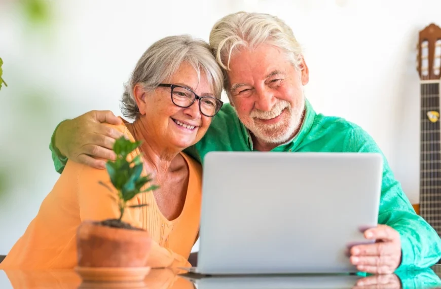 old couple using laptop